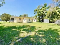 Building Photo - Charming 2 Bedroom Home with Fenced Yard & Screened Patio – Prime Location!