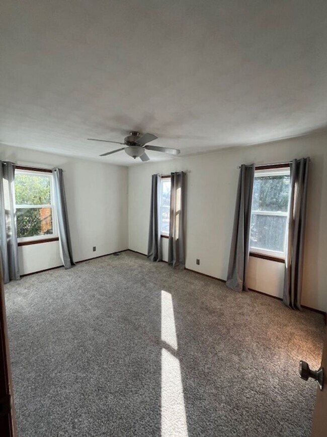 Building Photo - Spacious, Fully Updated Home with Walkout Basement on a Mature Lot