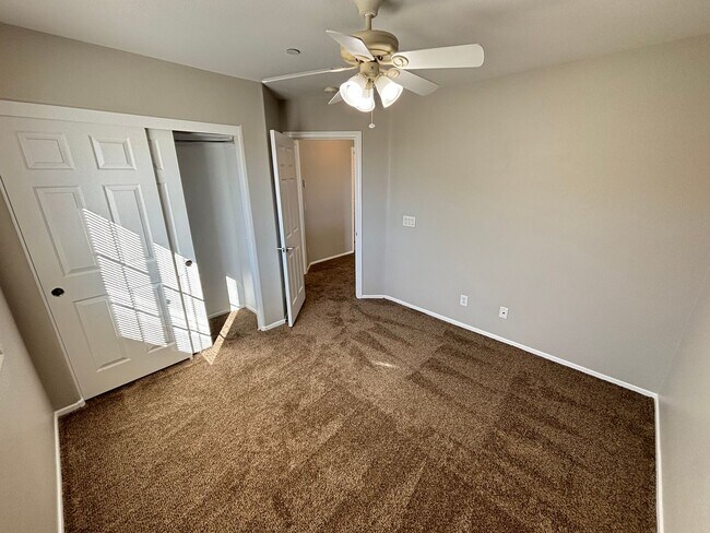 Building Photo - Spacious Tri-Level 4-Bedroom Home with Bal...