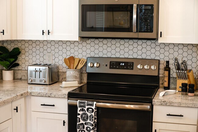 Building Photo - High-End, FULLY FURNISHED, Gated Community...