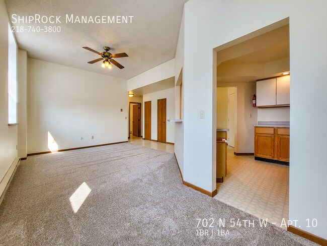 Building Photo - 702 N 54th Ave W