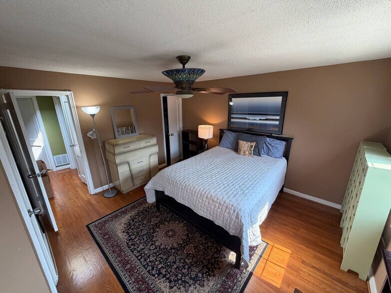 Master bed with 2 dressers, 2 closets, and desk nook (camera location) - 1723 N Cliff St