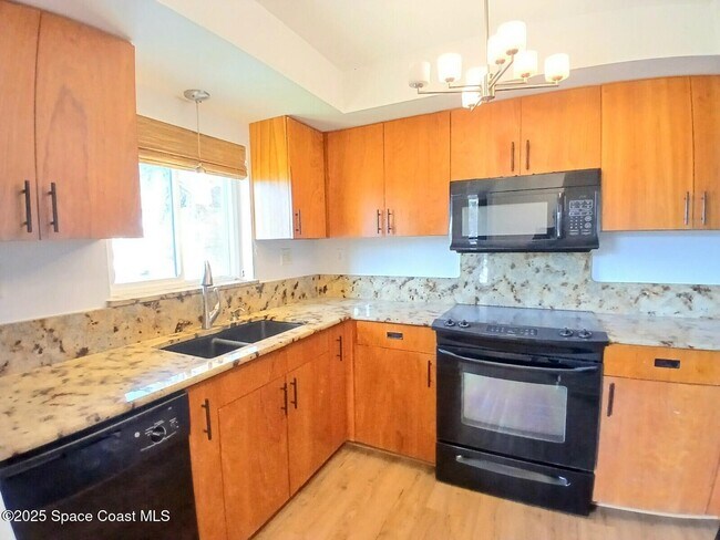 Building Photo - 325 S Banana River Blvd