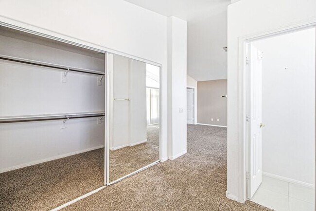 Building Photo - Spacious 4-Bedroom Home with Fireplace, 3-Car Garage & Great Backyard