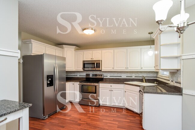 Building Photo - This gorgeous home is move-in ready for new residents!