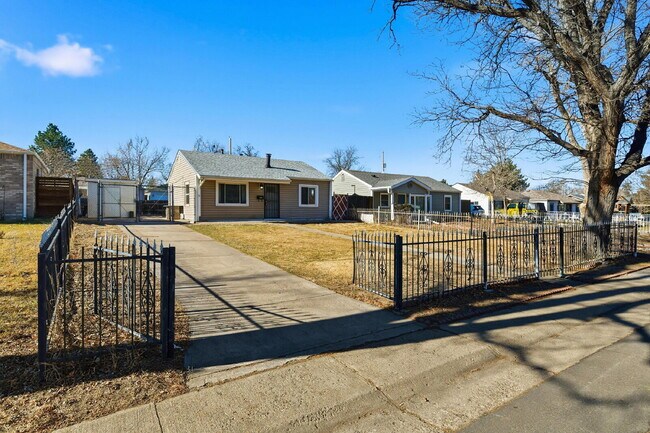 Building Photo - $1,930.95 - 3 Bedrooms, 1 Bathroom, Single Family Home in Aurora with fenced Yard!