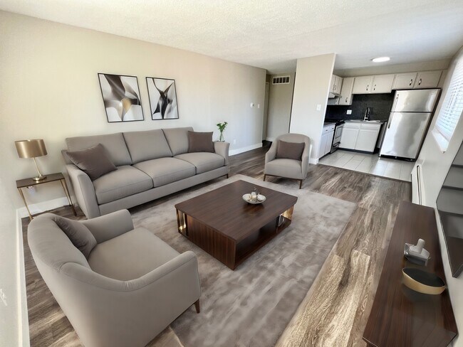 Experience comfort and style in this inviting living space, perfect for relaxation and entertainment. - Wadsworth Station West