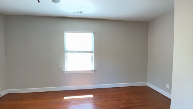 Building Photo - Charming 2BR with Sunroom, Hardwood Floors & Lawn Care Included