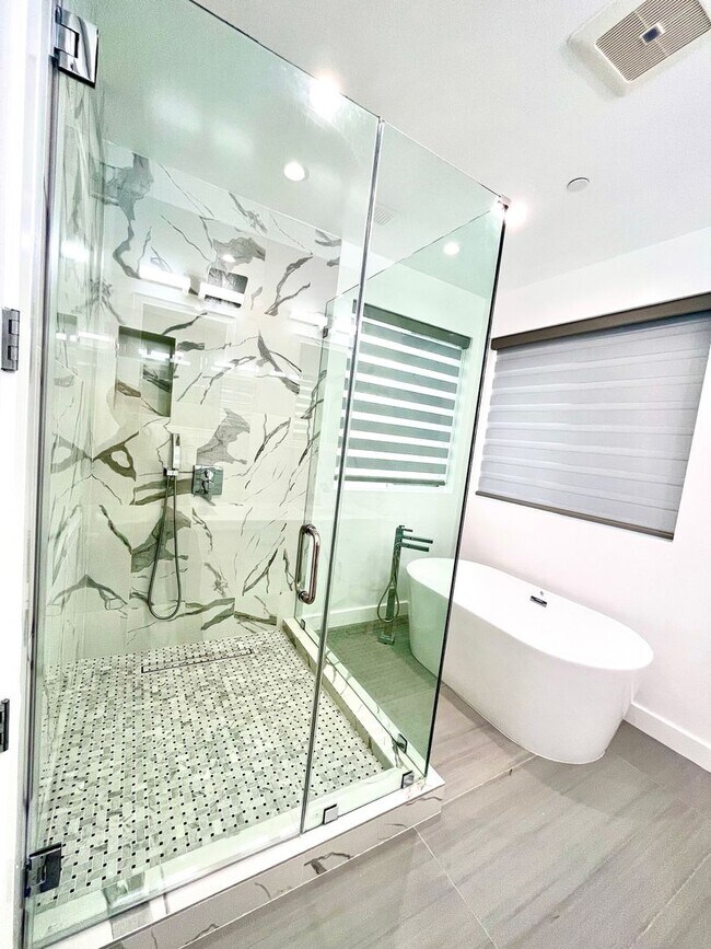 Building Photo - Newly built gated home with top of the lin...