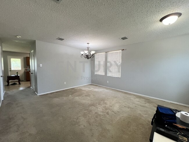Building Photo - Spacious 2-Story 3/2/2 Home with Versatile...