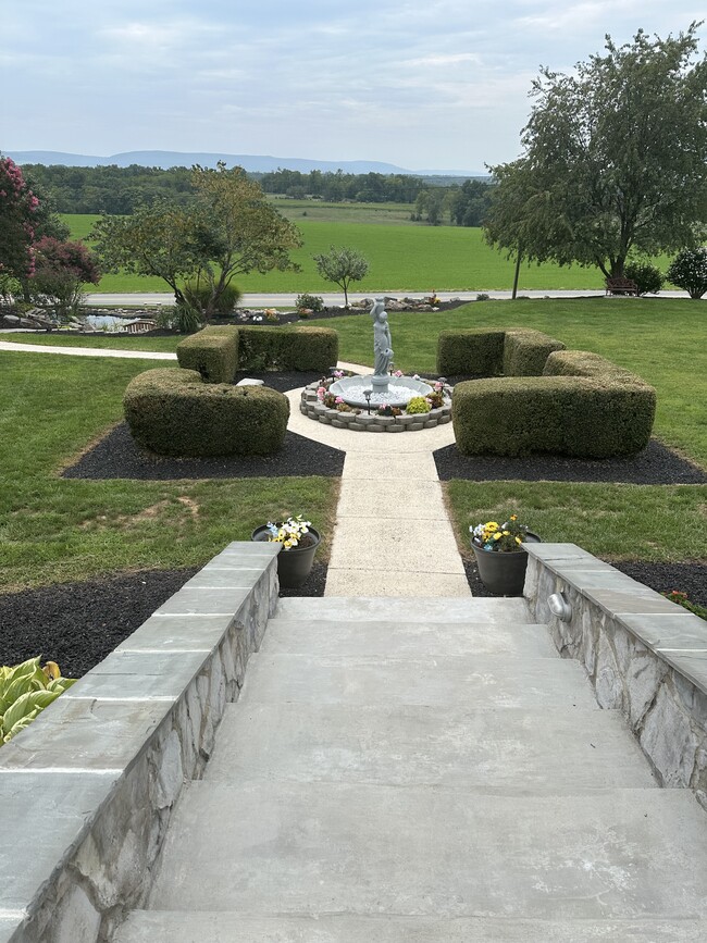 Circle with fountain in the front yard - 6245 Iron Bridges Rd