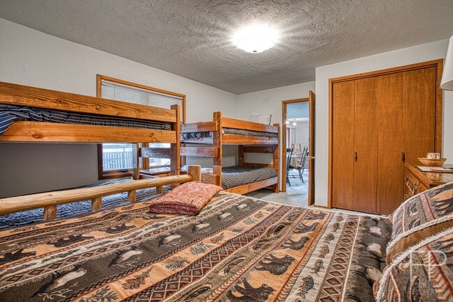 Building Photo - On the Blue River!  HUGE 4 Bedroom home, Furnished Updates throughout!  Bus route!  Spacious parking
