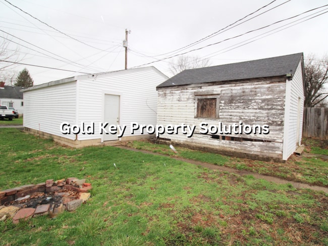 Building Photo - Large 2 BR 1 BA House with Family Room, Basement, Garage, and Separate Storage Building (SECTION ...