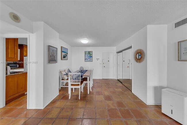 Building Photo - 5555 Collins Ave