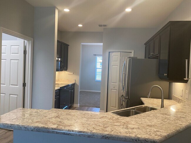 Building Photo - 4 Bedroom 3 Bath Waterfront Home in Gramercy Farms for RENT!