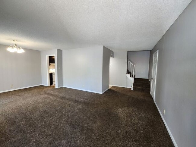 Building Photo - Large Townhome Apartment with 1 1/2 Baths and 2 Car Garage