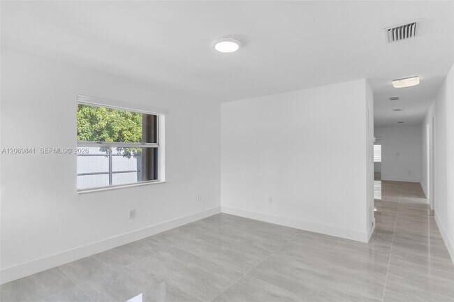 Building Photo - 9999 NW 25th Terrace