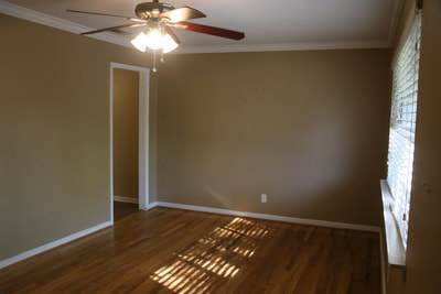 Building Photo - 3 bedroom  1 1/2 baths featuring large bed...
