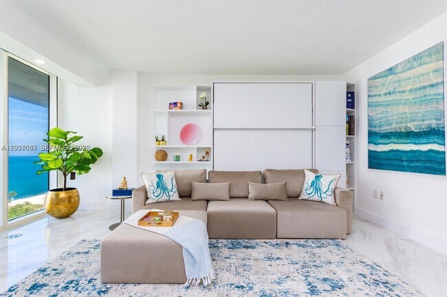 Building Photo - 10275 Collins Ave
