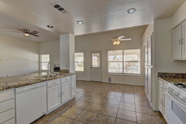 Building Photo - AMERICANA Property Mgmt - Great 2 story, 4 beds house with pool in Desert Shores