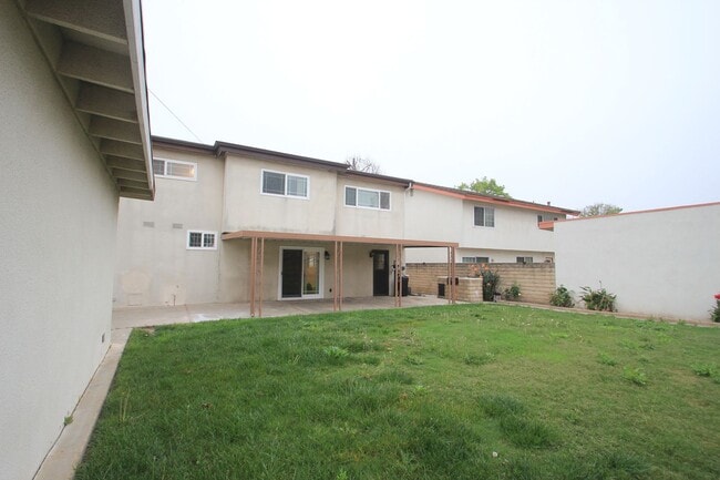 Building Photo - Welcome to this beautifully refreshed 4-bedroom, 2-bath two-story home located in desirable North...