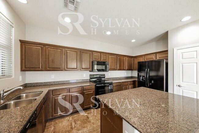 Building Photo - This home exudes a cheerful and welcoming charm!