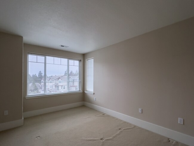 Building Photo - Enjoy this 3 Bedroom 2.5 Bathroom End Townhome ~ 2 Car Garage + Washer & Dryer! Great Cedar Mill ...