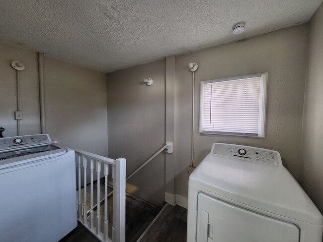 Building Photo - Two bedroom home with partially fenced yard!