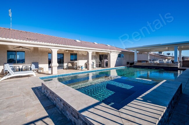 Building Photo - FURNISHED POOL HOME FOR APRIL 2026 AND MAY 2026