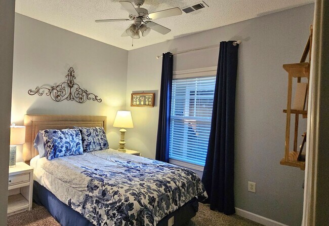 Building Photo - Stunning First-Floor, Fully Furnished Condo with Pond Views