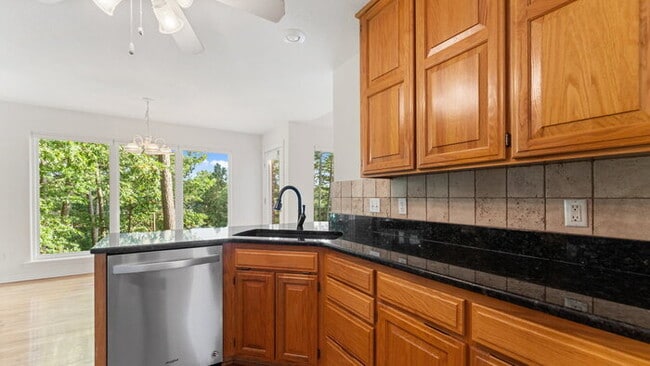 Building Photo - Serene Bella Vista Lakeside 4 bedroom