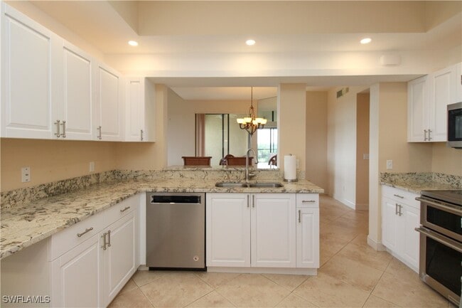 Building Photo - 7024 Pelican Bay Blvd