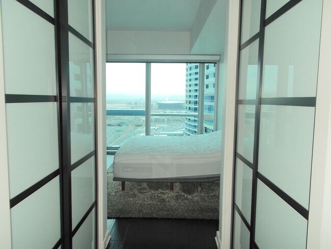 Building Photo - Experience elevated high-rise living at The Martin.