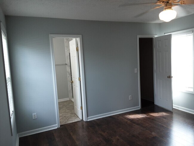 Building Photo - 1/2 off First Month Rent home has new flooring throughout.