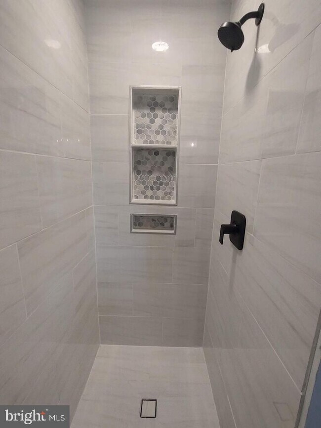 Building Photo - Amazing, updated end unit townhome backing to trees and open common area in Centre Ridge neighbor...