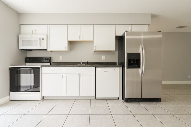 Building Photo - 5476/5478 Ave C