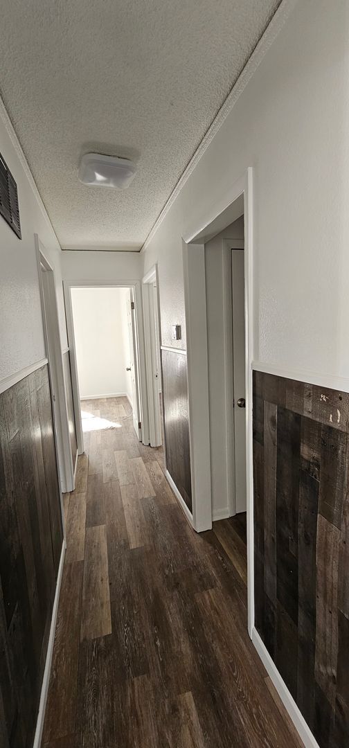 Building Photo - Renovated 4 bedroom with full unfinished basement