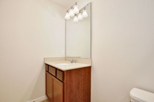 Building Photo - Immaculate Townhome · Dual En-Suite Bedrooms + Flex Loft · Cable & Internet Included · 3.5 Miles ...