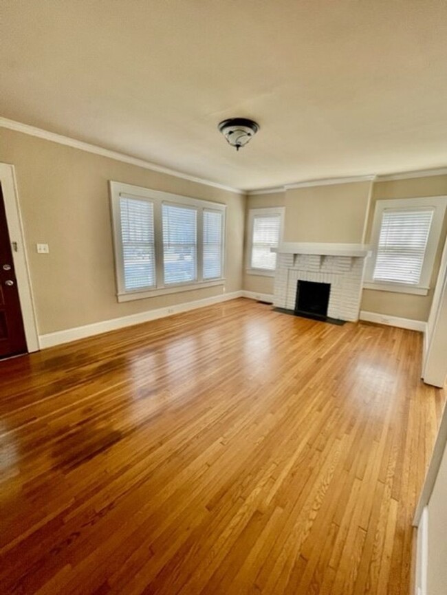 Building Photo - Introducing WesleyHeights401, a charming 3...