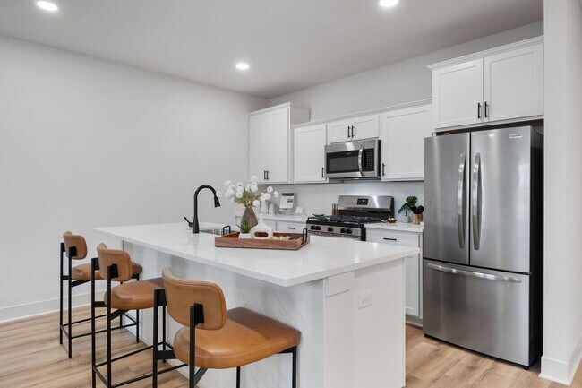 Building Photo - Brand New Three Bedroom Townhome in West L...
