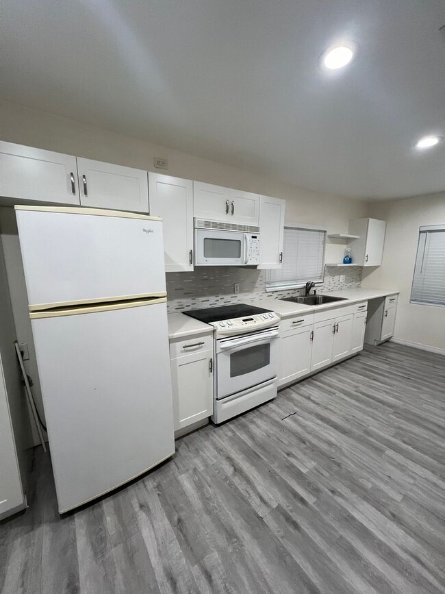 Building Photo - $200. OFF First Month's Rent!