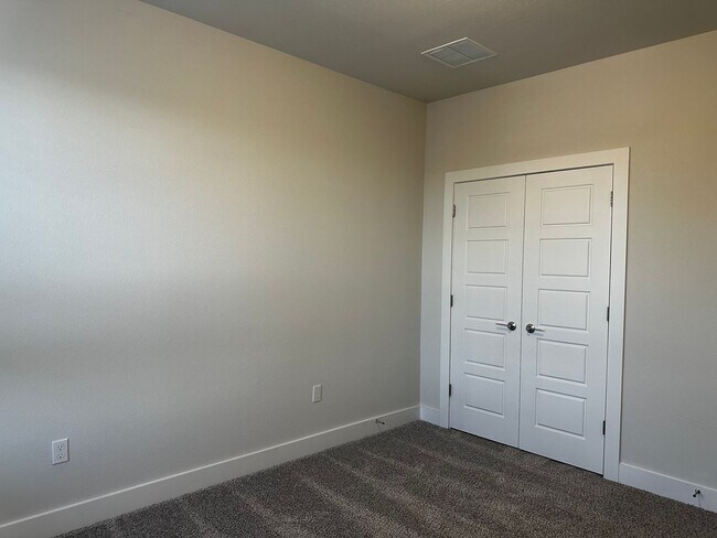 Building Photo - For Lease – Modern 2023 Condo Backing to Greenbelt | Creekside at Pioneer Crossing West