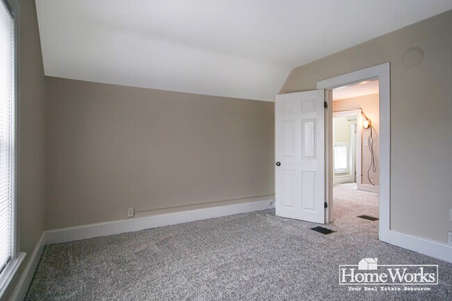 Building Photo - Charming 3 - Bedroom Home with Wrap-Around Porch on Corner Lot