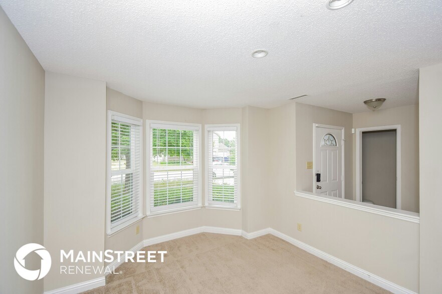 Building Photo - 8208 Firefly Way