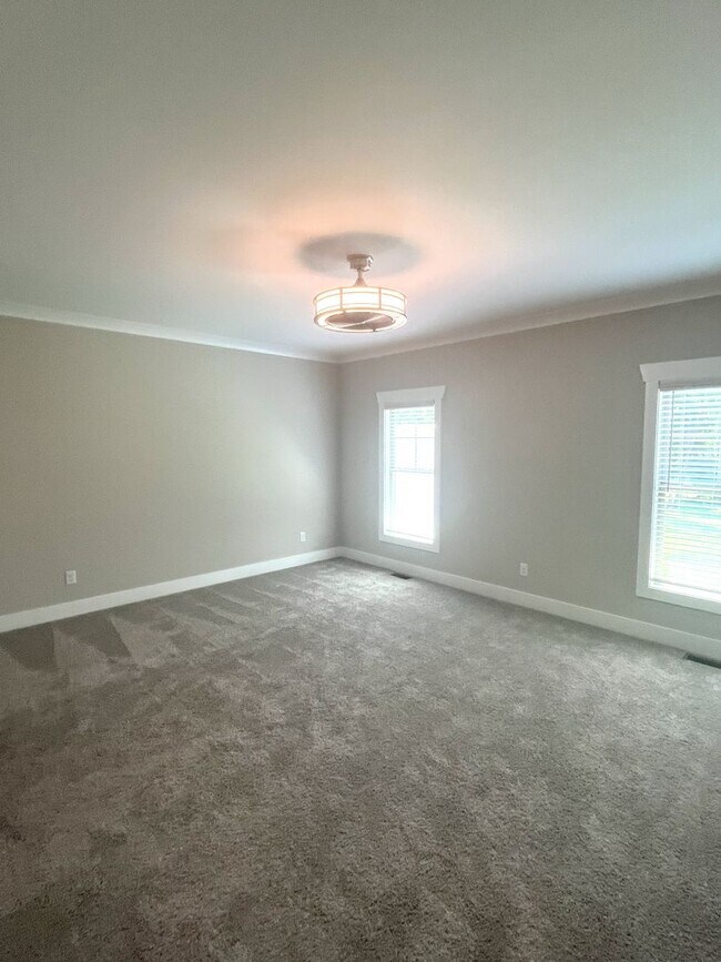 Building Photo - Luxury Townhouse in Summerfield NC