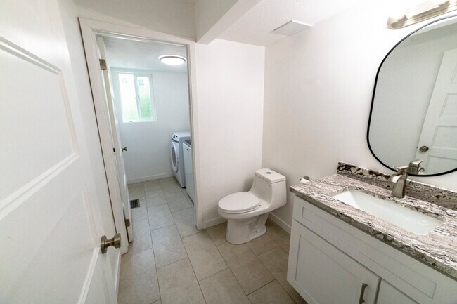 1/2 Bath Near Family Room & Garage Entry - 4968 S Spring Run Dr