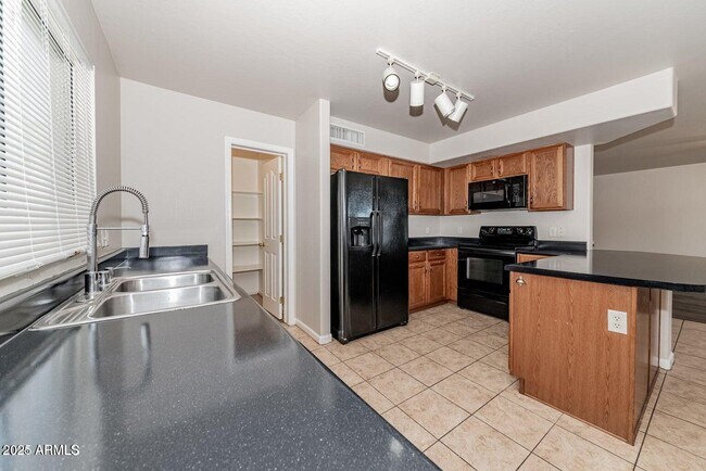 Building Photo - 1506 S 122nd Ln