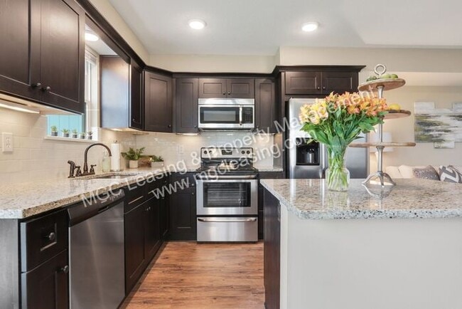 Building Photo - Modern Comfort & Cozy Kansas City Living at Serrano Townhomes