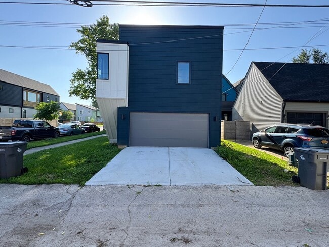 Building Photo - Vaulted Ceilings & Hardwood Floors in This Charming Indianapolis L