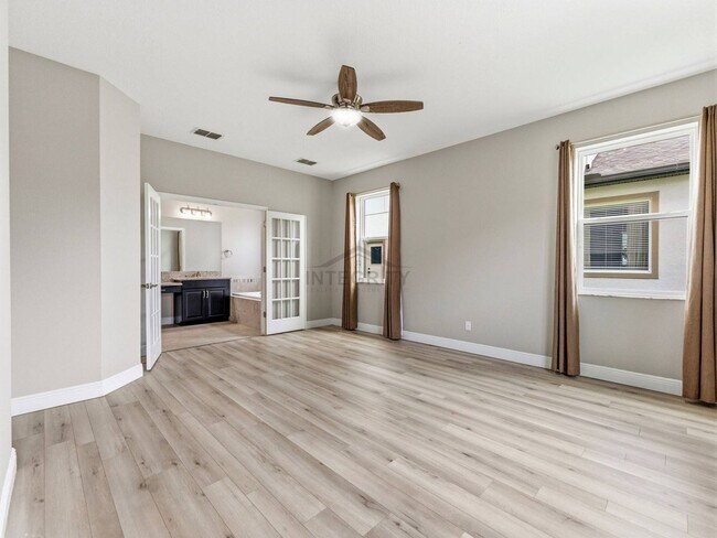 Building Photo - 8947 Garden Party Dr